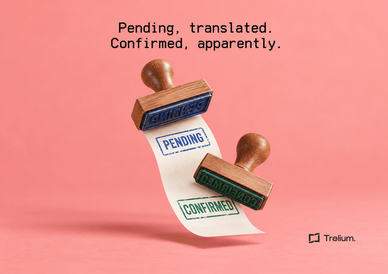 Two rubber stamps float over a paper strip stamped PENDING in blue and CONFIRMED in green on a coral-pink background.